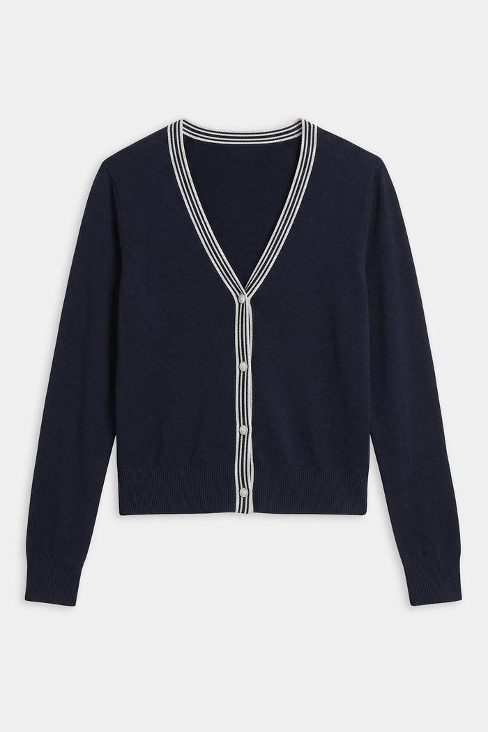 The SPLITS59 Bekah Knit Cardigan in Indigo/White features a V-neck and white striped trim along the neckline, button placket, and hem for a touch of effortless style.