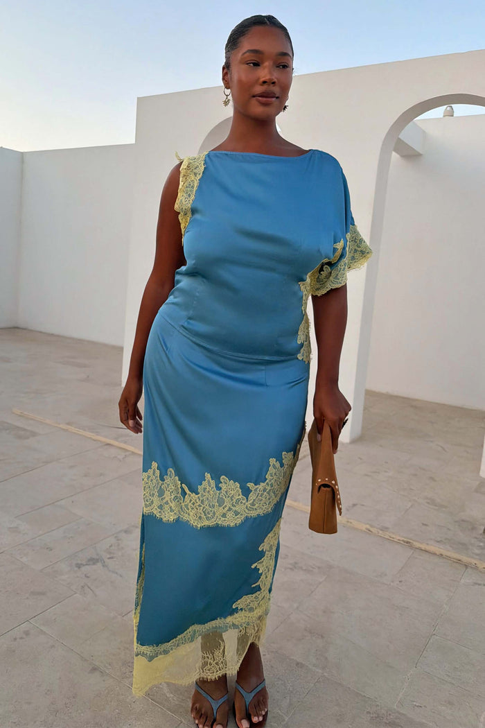 Blue and Lemon Millie Skirt in satin with an asymmetric lace hem, worn as a co-ord for inclusive sizing.