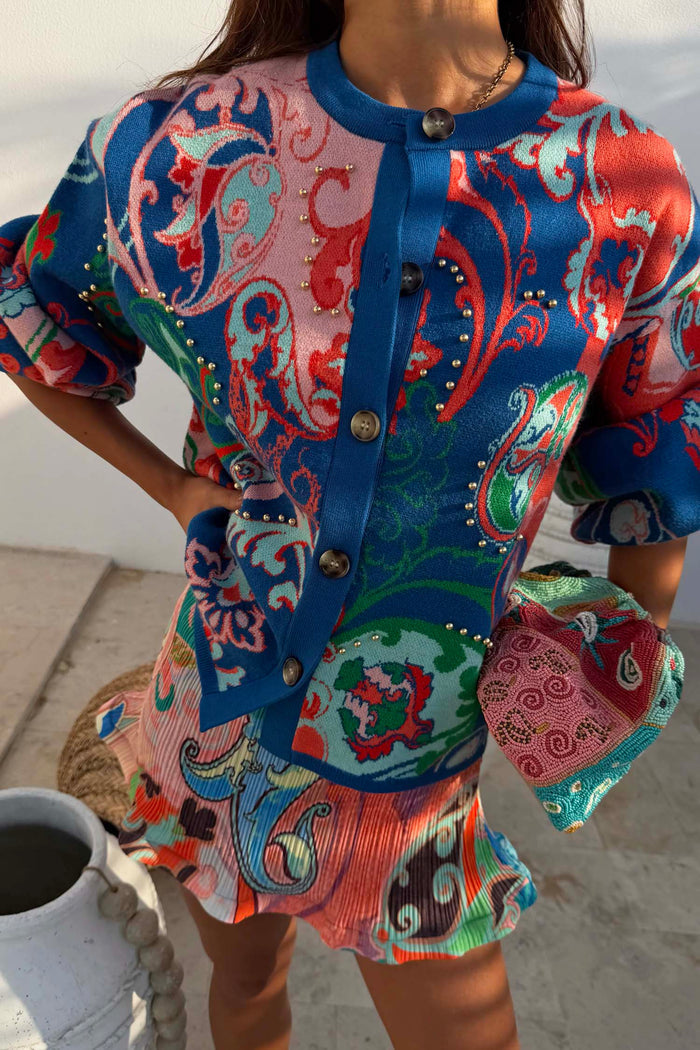 Blue Mari Cardigan featuring an iconic paisley print, gold stud details and a soft-touch knit finish.