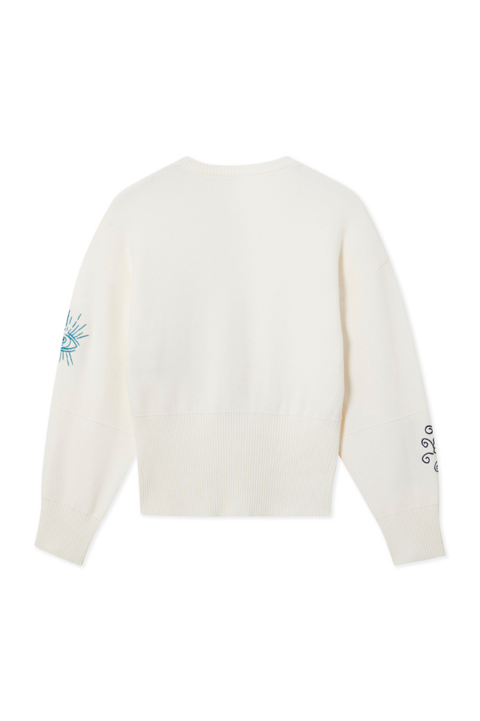 Cream Darcy Cardigan featuring neon embroidered sleeve motifs and a ribbed hem, a versatile transeasonal layer.