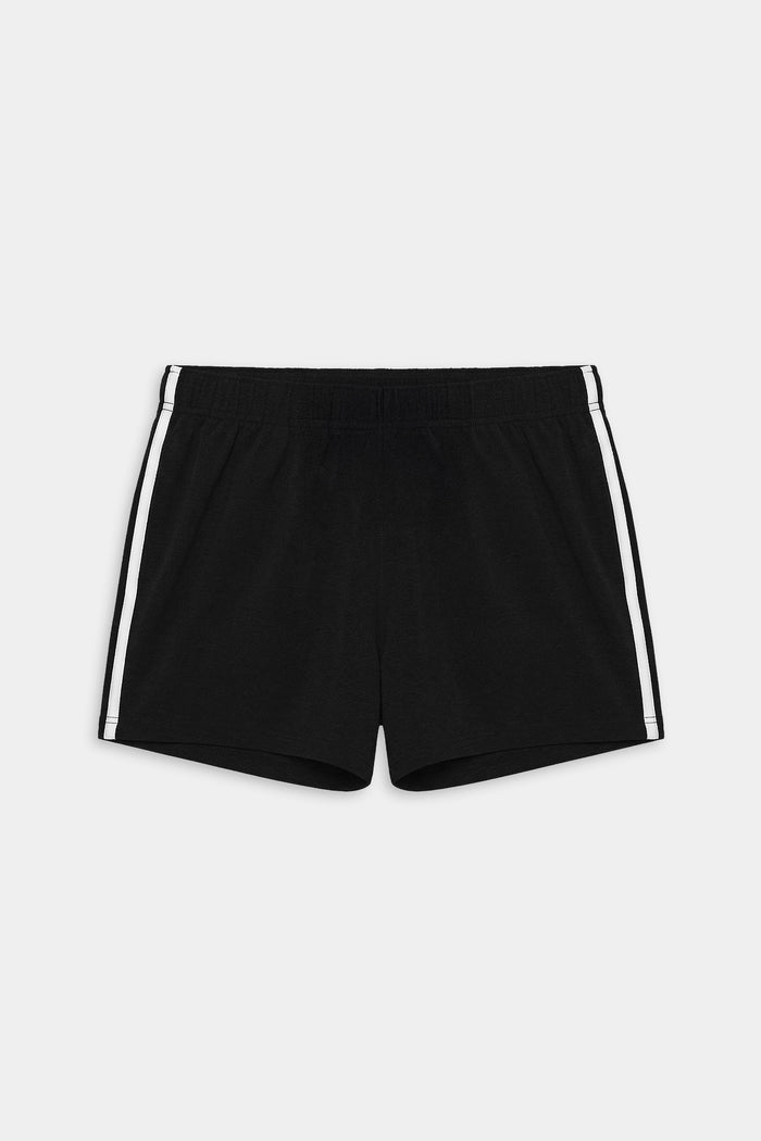 The SPLITS59 Ella Airweight Track Short in Black/White features ultra-light fabric, an elastic waistband, and white side stripes—ideal for hot yoga or active routines. Shown flat against a white background.