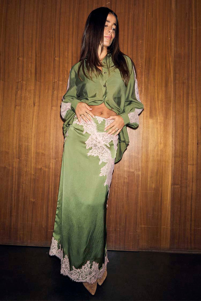Olive & Pink Lily Skirt in olive satin with pink lace trim, styled as a co-ord with a matching shirt.