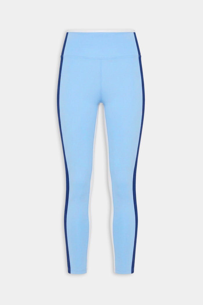 The SPLITS59 Sam High Waist Rigor 7/8 leggings in Skylight/Cobalt feature a light blue design with dark blue side panels, showcased on a plain white background.