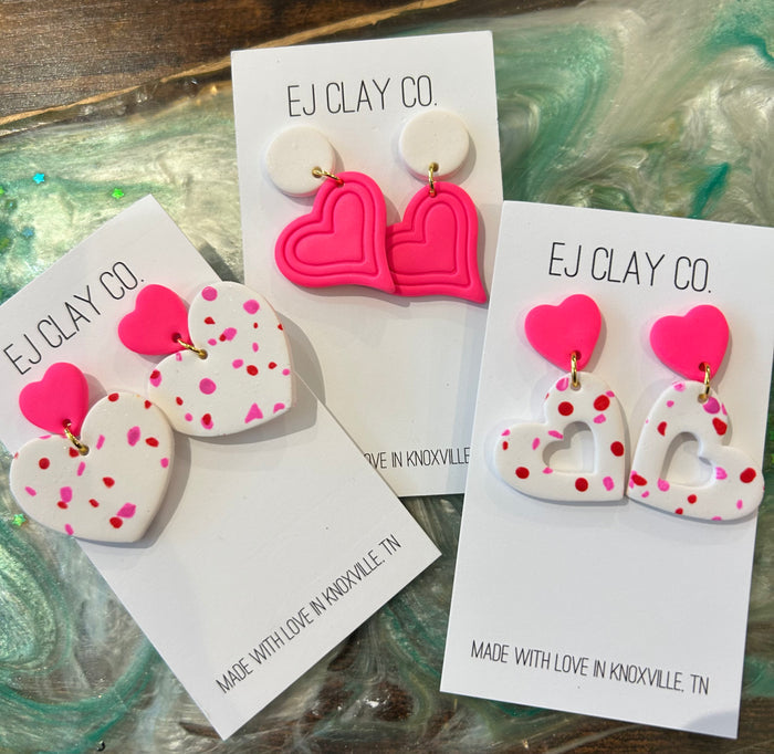 Neon pink earrings 1.6
