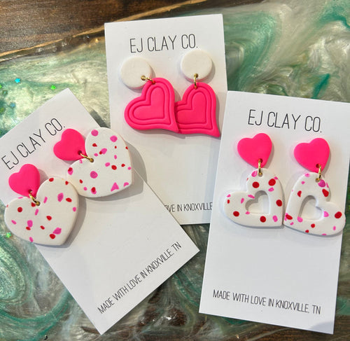 Neon pink earrings 1.6