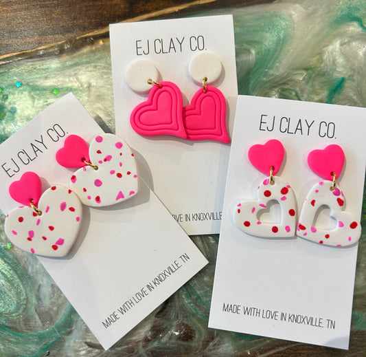 Neon pink earrings 1.6