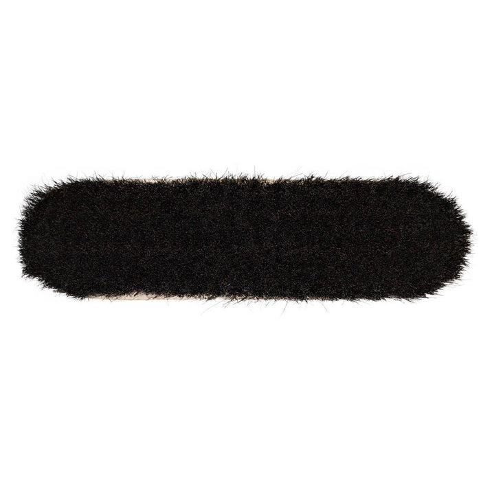 A handcrafted shoe polishing brush with a black and white oxhorn handle and dark bristles, presented on a plain background.