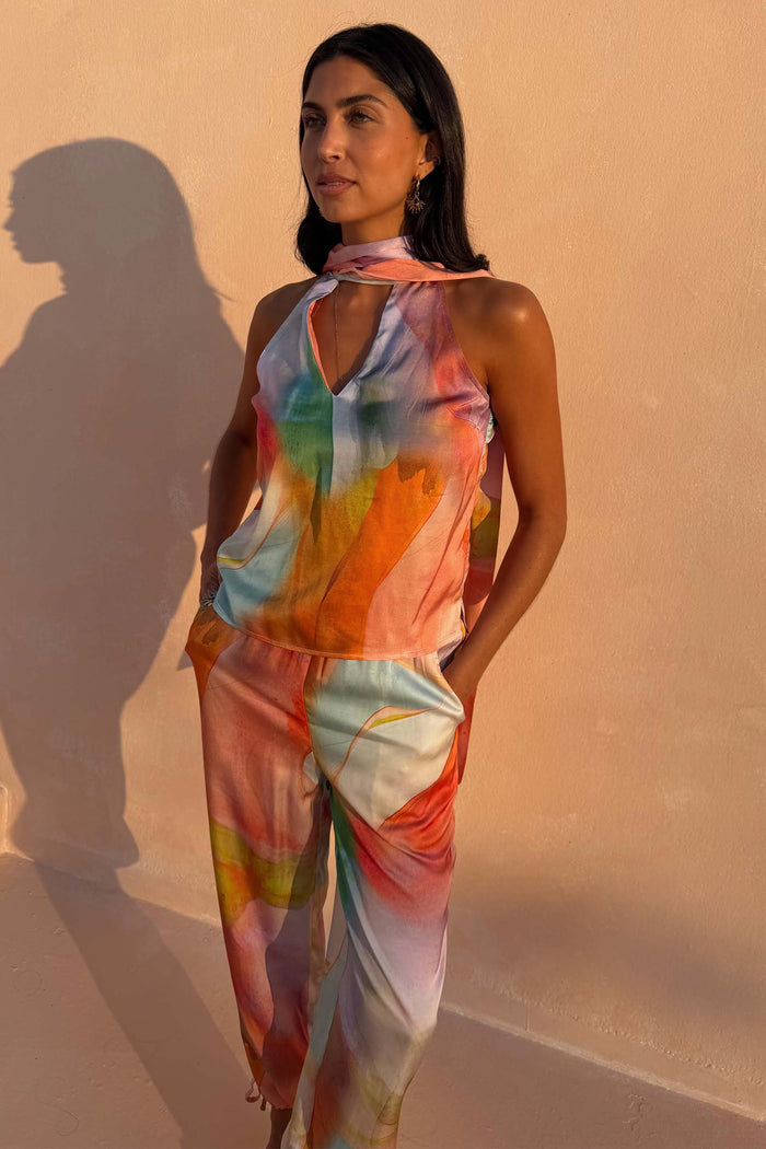 Abstract Lily Top in a multicoloured satin-esque print with a multi-wear tie-neck, styled as a co-ord.