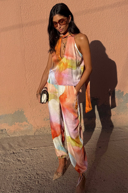Abstract Lily Top in a pink and orange watercolor print with a multi-wear tie neck, worn as a co-ord.