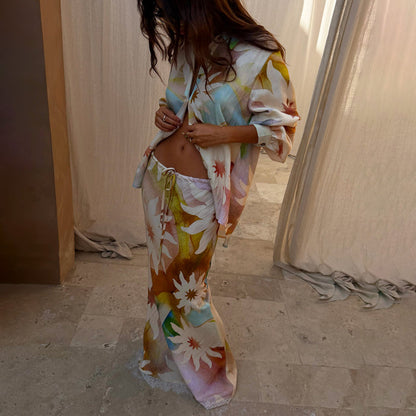Abstract Soleil Mabel Skirt with sun motifs, a drawstring waist and lace hem detailing, paired with a matching shirt.