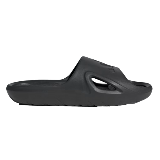 Profile view of a single all-black slide sandal featuring a thick, contoured sole and a side cutout on the strap.