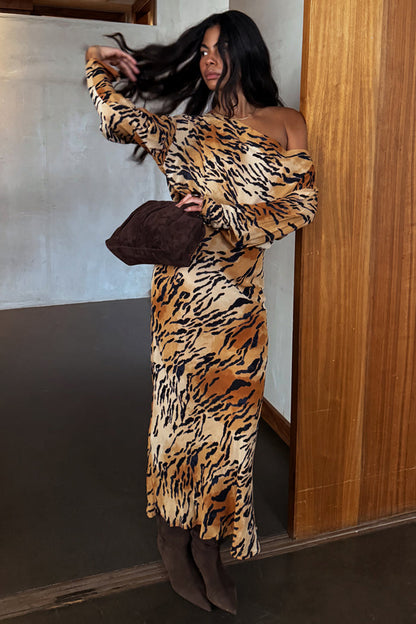 Tiger print Animal Tilly Dress with an off-the-shoulder silhouette and multi-wear long sleeves.