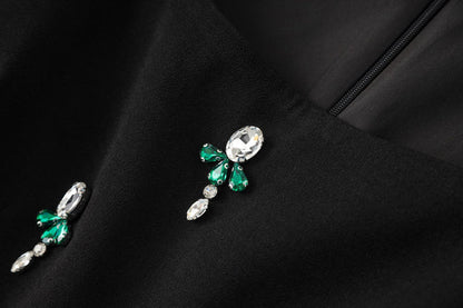 asymmetrical embroidered gown with emerald satin detail – NOIR