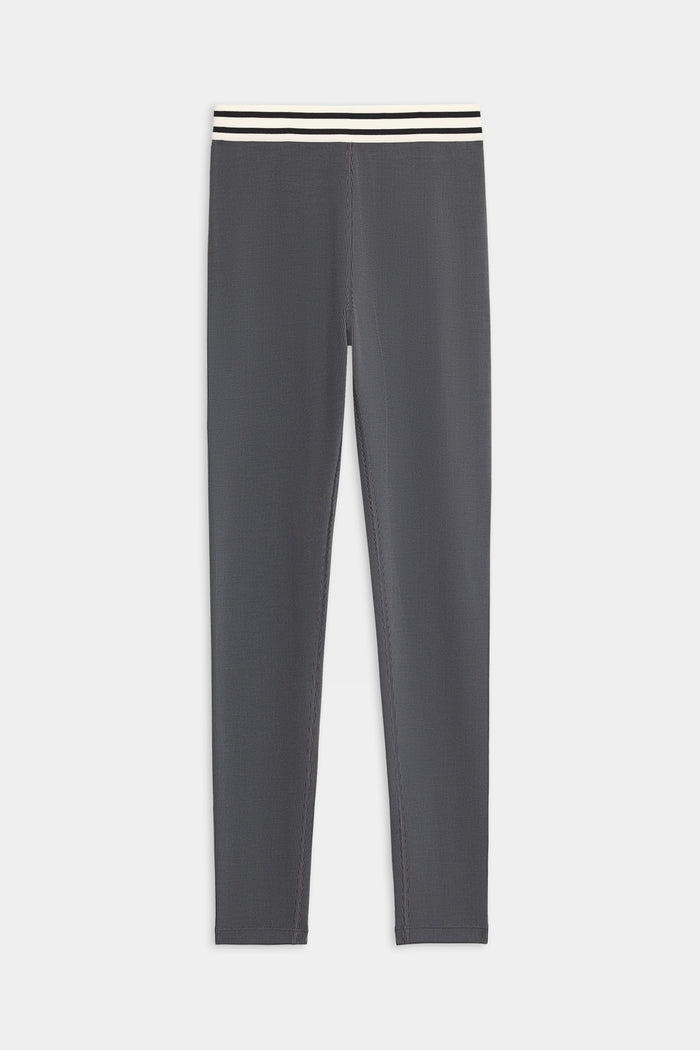 The SPLITS59 Bailey Active Rib High Waist 7/8 leggings feature a slim fit in gray with a white and black striped elastic waistband, shown flat against a white background.