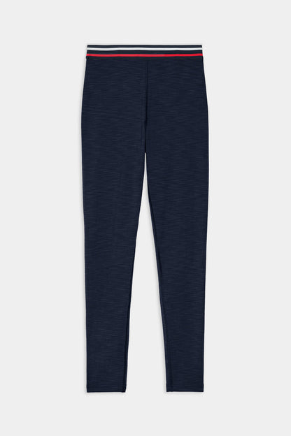 The SPLITS59 Bailey High Waist Active Rib 7/8 leggings in Heather Indigo feature a fitted design and a striped elastic waistband in white, black, and red—crafted from active rib fabric for gym workouts. Shown on a white background.