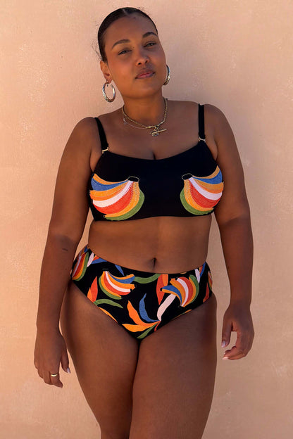 Black Banana Bandeau Bikini Top with colourful embroidered banana motifs, shown on a curve model for inclusive sizing.