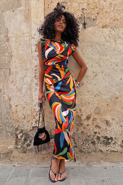 Banana Dorris Skirt with a hand-painted multicoloured banana print on black jersey, worn as a matching co-ord.