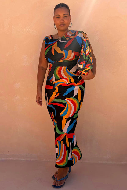 Banana Dorris Skirt in a multicoloured hand-painted print on black jersey, styled as a midi co-ord for inclusive sizing.