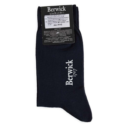 A pair of black Berwick 1707 cotton blend plain socks with the brand tag visible.