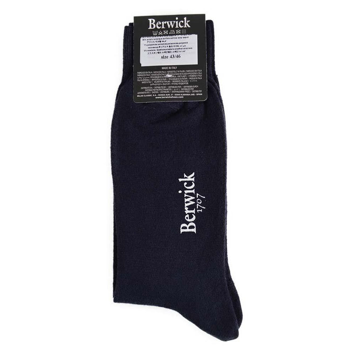 A pair of black plain knit socks with the Berwick 1707 brand tag visible.