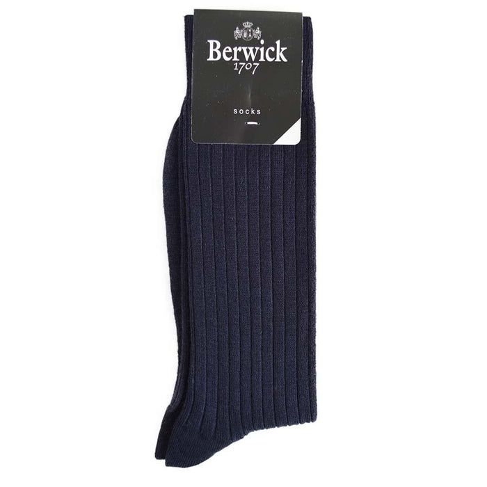 A pair of navy ribbed socks with the Berwick 1707 brand tag visible.