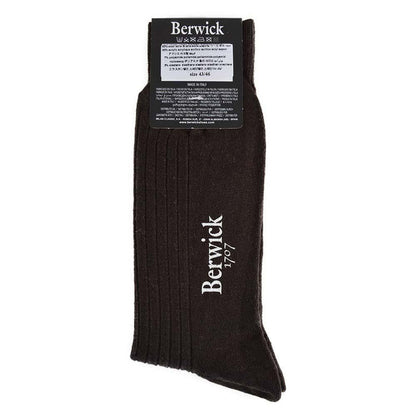 A pair of brown ribbed socks with the Berwick 1707 brand tag visible.
