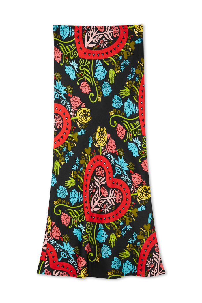 Black Amara Dorris Skirt featuring vibrant hand-painted heart and eye motifs in a relaxed midi silhouette.