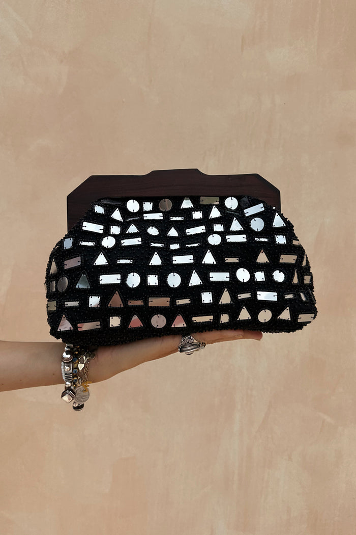 Black Beaded Mirror Bag with silver geometric glass embellishments and a dark wooden handle.
