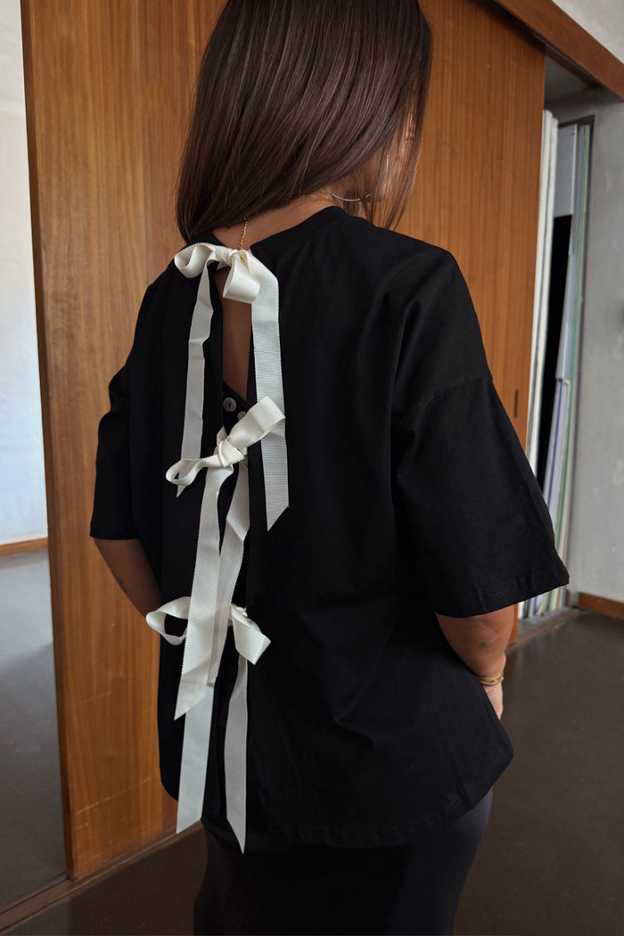Black Bow Back T-Shirt with cream ribbon bow fastenings and an open back in a relaxed cotton fit.