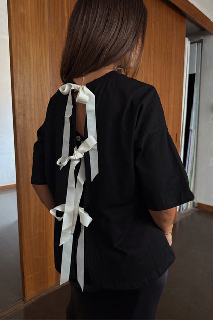 Black Bow Back T-Shirt with cream ribbon bow fastenings and an open back in a relaxed cotton fit.