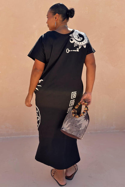 Black Dolce Vita T-Shirt Dress featuring white hand-painted sun motifs and Greek graphics on a cotton maxi.