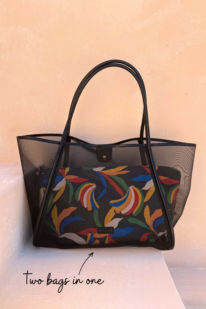Black Mesh Tote Bag with leather straps and a removable banana print pouch, annotated with 'Two bags in one'.