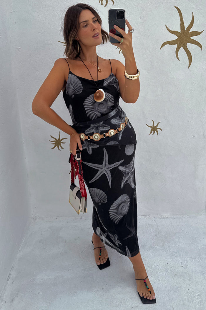Black Seashell Mesh Cami Dress featuring white starfish and shell prints on breathable mesh with thin cami straps.