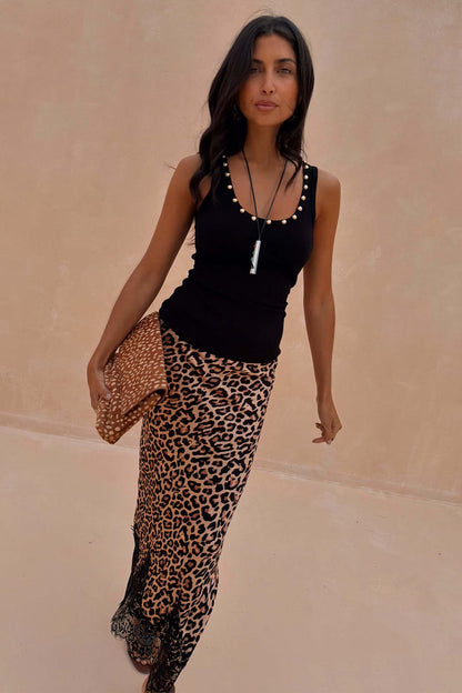 Black Studded Rib Vest with gold stud detailing at the neckline, styled with a leopard print midi skirt.