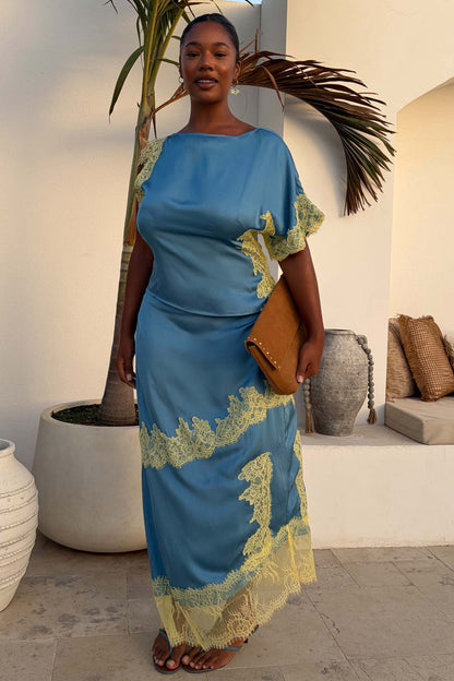 Blue and Lemon Kira Top with lemon lace and an asymmetric hem, styled as a co-ord with the matching skirt.
