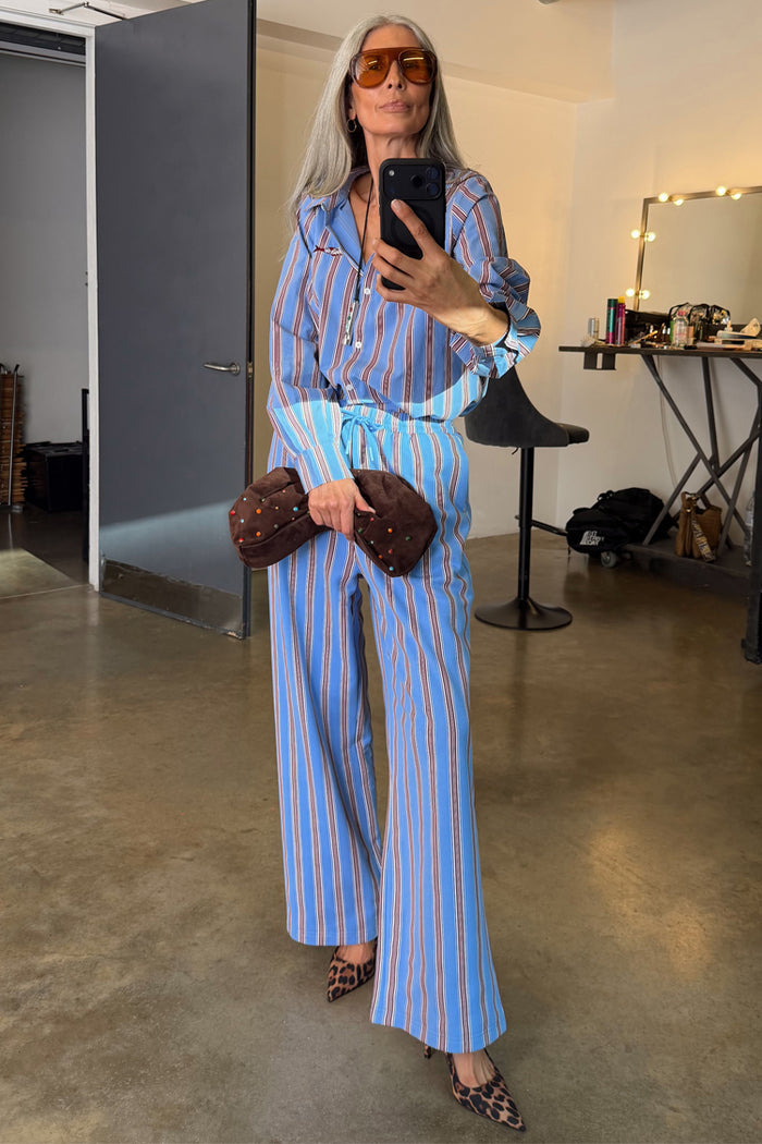 Blue Cotton Stripe Jogger styled as a co-ord with matching shirt, featuring red pinstripes and leopard print heels.