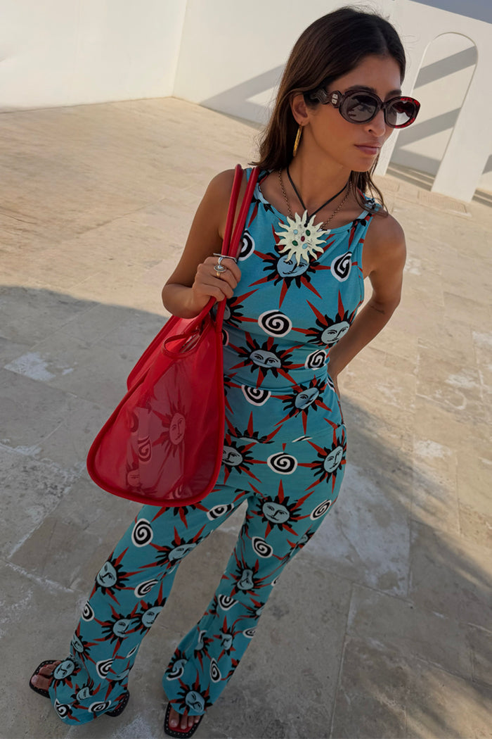 Blue Sun Tank Top with hand-painted sun and swirl motifs, styled as a co-ord with matching trousers.