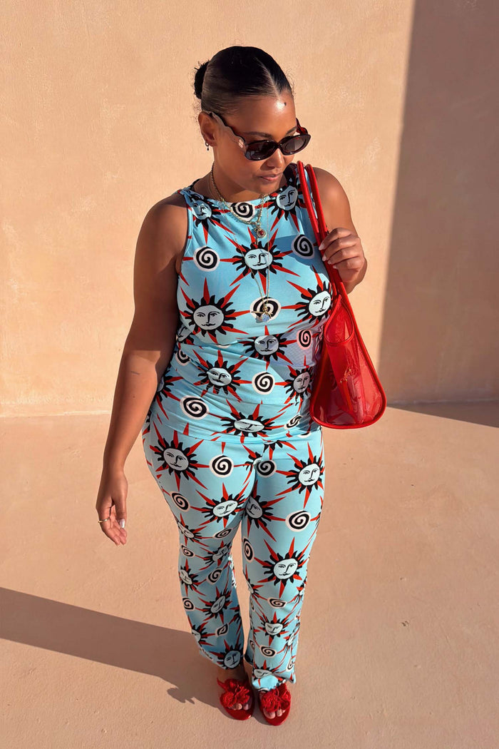 Blue Sun Tank Top with hand-painted sun and swirl motifs, styled as a matching jersey co-ord set.