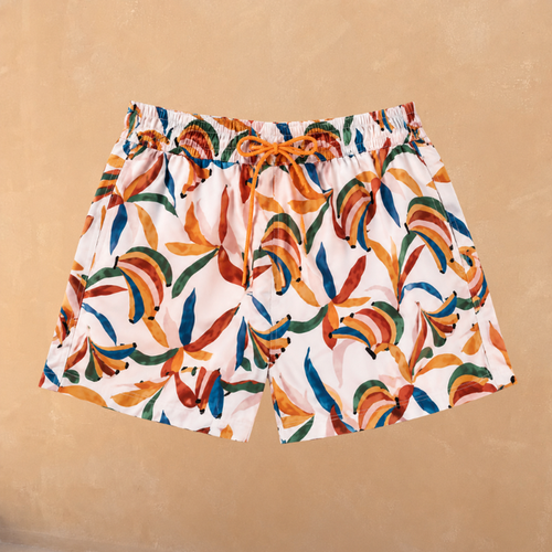 Boy's Banana Print Swim Shorts in cream recycled polyester with an orange drawstring and elasticated waistband.