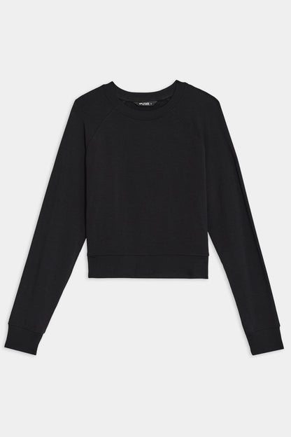 The Brooks Fleece Long Sleeve Sweatshirt in black by SPLITS59, made in Los Angeles, is shown on a white background. Ideal for yoga or a casual day out.