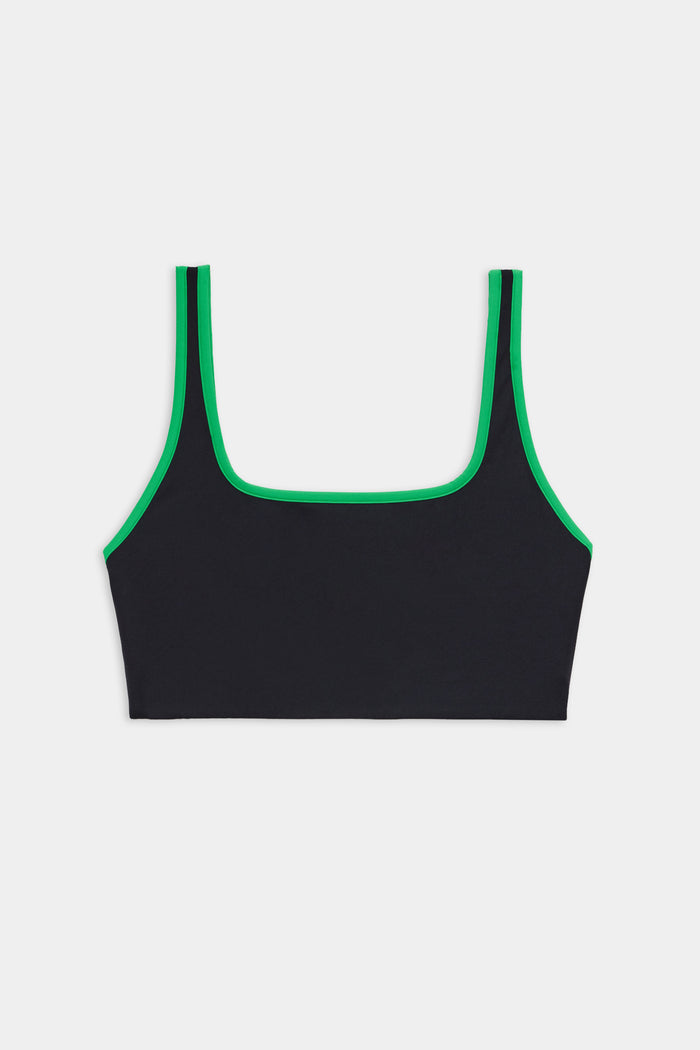 The SPLITS59 Cait Rigor Bra in Black/Grass features a square neckline and green trim, made from high performance Rigor fabric for high impact workouts. Shown on a white background.