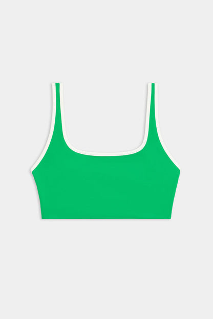 SPLITS59 Cait Rigor Bra in Grass/White, featuring a square neckline and high-performance Rigor fabric, shown on a plain light background.