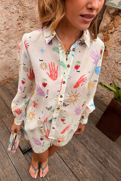 Oversized Celestial Marley Shirt in cream featuring a colourful print of palms, suns and hearts.