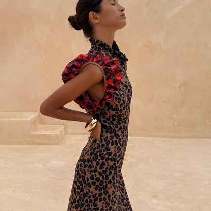Cherry Leopard Remi Dress with leopard print, red cherry pleated frill sleeves and a high ruffled neck.