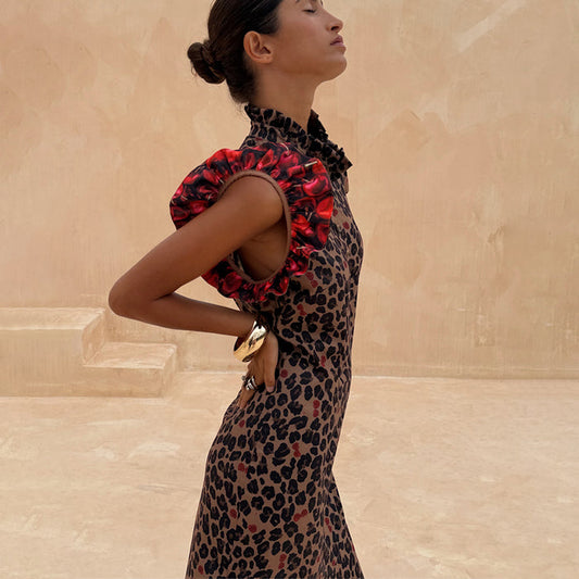 Cherry Leopard Remi Dress with leopard print, red cherry pleated frill sleeves and a high ruffled neck.