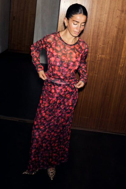 Cherry Mesh Dorris Skirt and matching long-sleeve top in a vibrant cherry print on a stretchy mesh base.