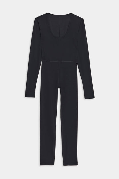 The SPLITS59 Chloe Airweight Jumpsuit in black features long sleeves, a full-length fit, and a scoop neckline. Made from lightweight Airweight fabric, it’s perfect for workouts and showcased on a plain white background.