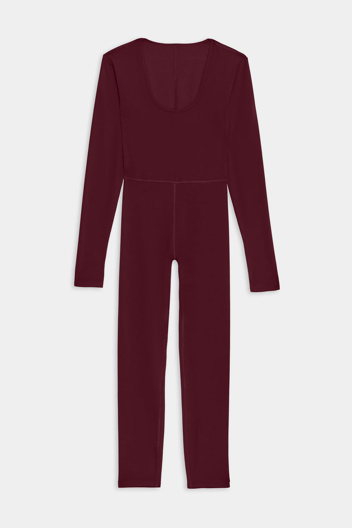 The SPLITS59 Chloe Airweight Jumpsuit in Dark Cherry features long sleeves, a full-length fit, and a scoop neckline in soft Airweight fabric—perfect for your next workout.