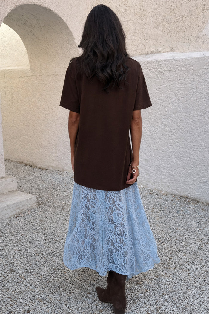 Chocolate Cara T Shirt Dress featuring a brown cotton top and an attached blue floral lace midaxi skirt.