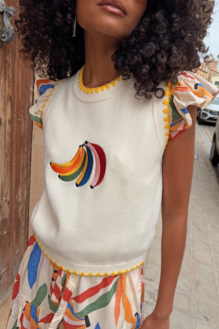 Cream Banana Tank featuring a colourful embroidered banana motif and yellow contrast stitching at the neckline and hem.